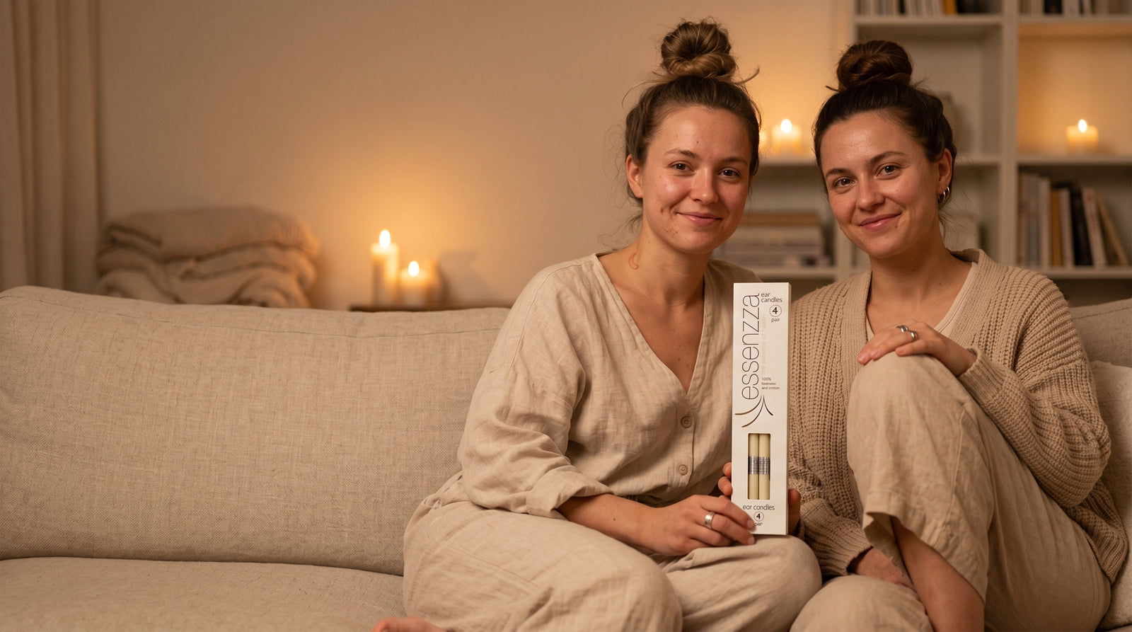 Essenzza Original ear candles held by two friends — a shared, screen-free relaxation ritual to do together
